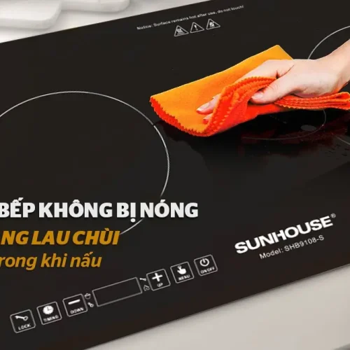 Mặt kính bếp điện từ đôi SUNHOUSE SHB9108-S 2600W/2200W đang lau chùi