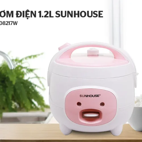 Nồi cơm điện SUNHOUSE SHD8217W màu trắng hồng đặt trên bàn bếp
